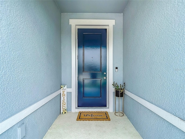 35428 Crescent Creek Dr, Zephyrhills, FL 33541 - view of exterior entry featuring stucco siding