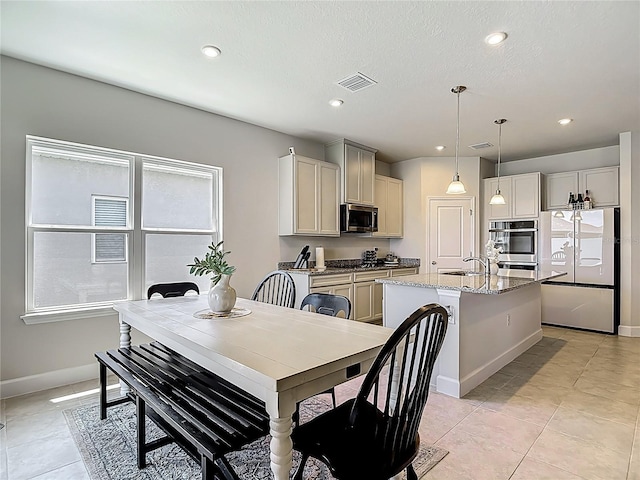 35428 Crescent Creek Dr, Zephyrhills, FL 33541 - dining room with recessed lighting and light tile patterned floors