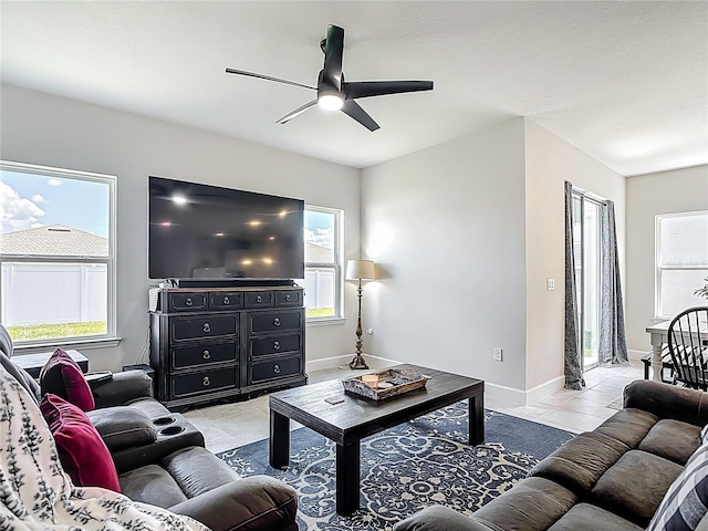 35428 Crescent Creek Dr, Zephyrhills, FL 33541 - living room with ceiling fan and light tile patterned flooring