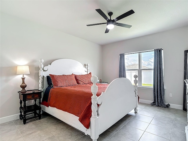 35428 Crescent Creek Dr, Zephyrhills, FL 33541 - bedroom with light tile patterned flooring and a ceiling fan