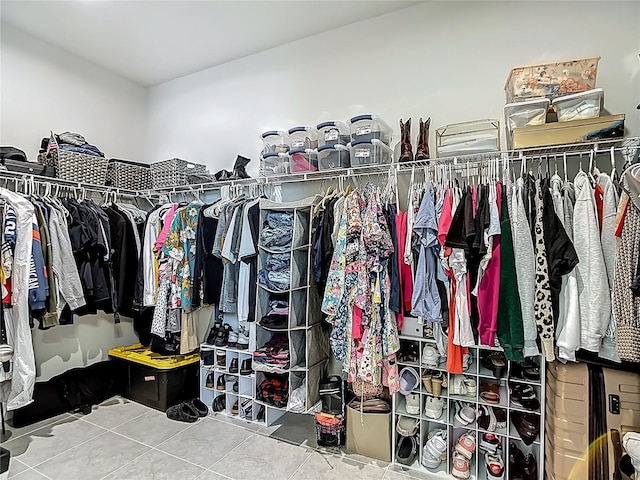 35428 Crescent Creek Dr, Zephyrhills, FL 33541 - walk in closet with tile patterned floors