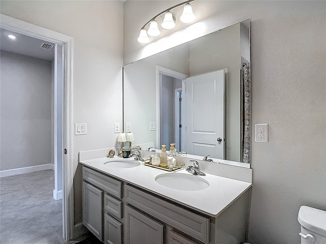 35428 Crescent Creek Dr, Zephyrhills, FL 33541 - full bathroom featuring double vanity and tile patterned floors