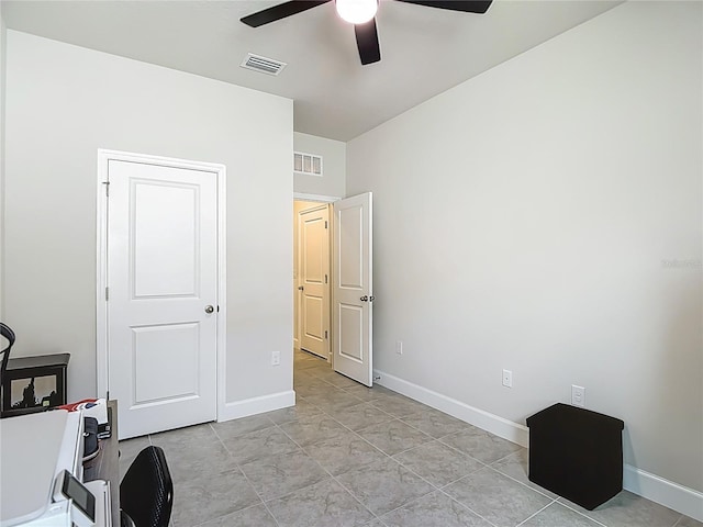 35428 Crescent Creek Dr, Zephyrhills, FL 33541 - unfurnished bedroom featuring baseboards and a ceiling fan