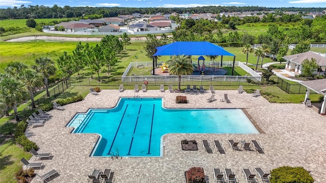 35428 Crescent Creek Dr, Zephyrhills, FL 33541 - community pool featuring a gazebo and a residential view