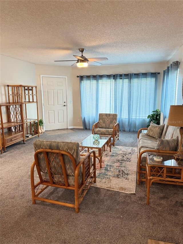 1550 S Belcher Rd Unit 335, Clearwater, FL 33764 - carpeted living room featuring a ceiling fan and a textured ceiling