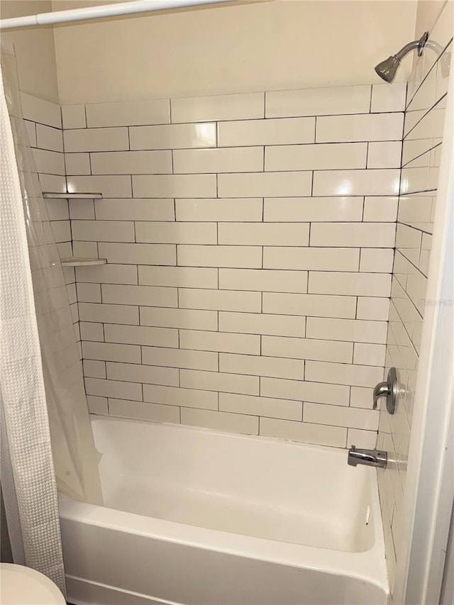 1550 S Belcher Rd Unit 335, Clearwater, FL 33764 - bathroom with shower / bath combination with curtain and toilet