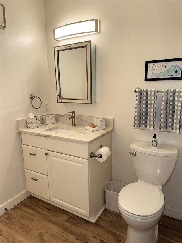 1550 S Belcher Rd Unit 335, Clearwater, FL 33764 - bathroom featuring vanity and wood finished floors