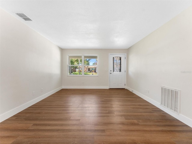 1024 San Marco Dr, Largo, FL 33770 - foyer entrance featuring baseboards and wood finished floors