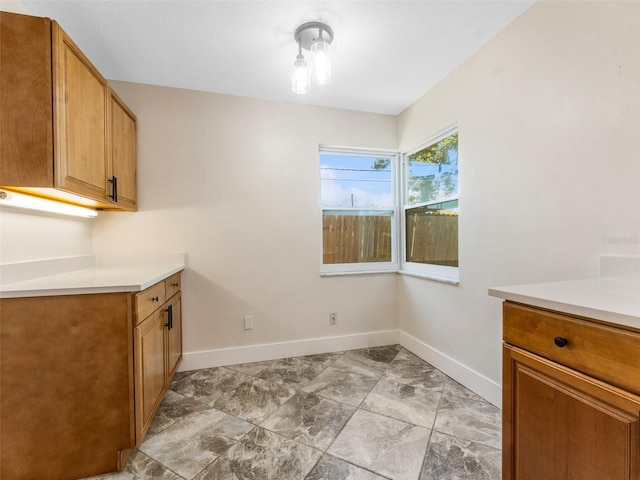 1024 San Marco Dr, Largo, FL 33770 - unfurnished dining area with baseboards