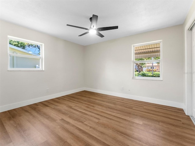 1024 San Marco Dr, Largo, FL 33770 - spare room featuring wood finished floors and a ceiling fan