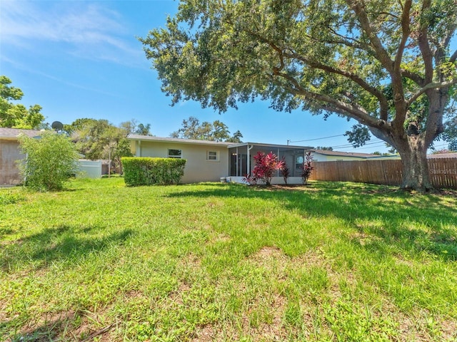 1024 San Marco Dr, Largo, FL 33770 - view of yard featuring a sunroom