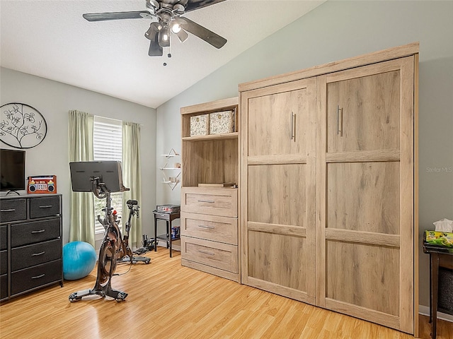 3509 Williston Loop, Land O Lakes, FL 34639 - exercise room with lofted ceiling, light wood finished floors, and ceiling fan