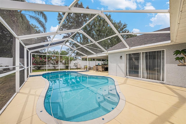 3509 Williston Loop, Land O Lakes, FL 34639 - view of pool featuring a patio area, a fenced backyard, and glass enclosure