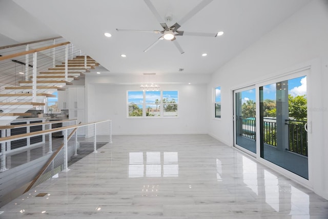 18077 3rd St E, Redington Shores, FL 33708 - unfurnished living room featuring a chandelier, recessed lighting, and a ceiling fan
