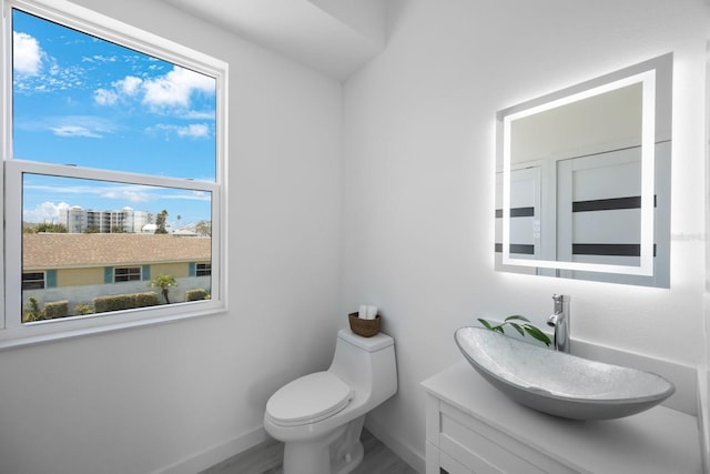 18077 3rd St E, Redington Shores, FL 33708 - half bath with vanity and wood finished floors