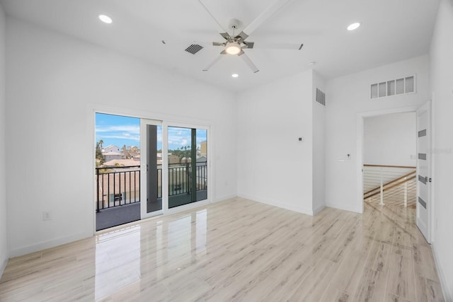 18077 3rd St E, Redington Shores, FL 33708 - empty room with ceiling fan, light wood-style flooring, and recessed lighting