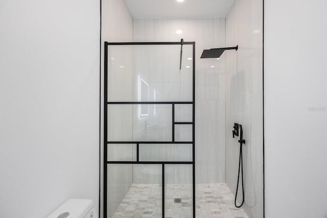 18077 3rd St E, Redington Shores, FL 33708 - full bathroom featuring toilet and a tile shower