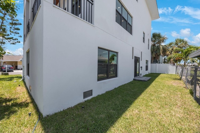 18077 3rd St E, Redington Shores, FL 33708 - view of side of property with stucco siding