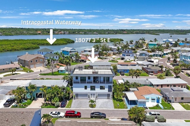 18077 3rd St E, Redington Shores, FL 33708 - aerial view of residential area featuring a large body of water