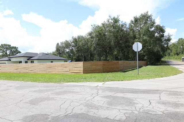 2522 W Castle Rd, Dunnellon, FL 34434 - view of asphalt road featuring traffic signs
