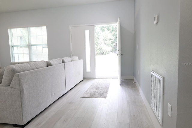 2522 W Castle Rd, Dunnellon, FL 34434 - living room featuring plenty of natural light and light wood-style flooring