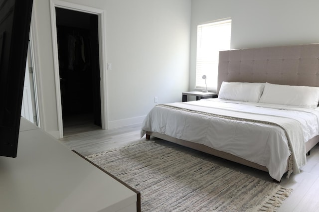 2522 W Castle Rd, Dunnellon, FL 34434 - bedroom with light wood finished floors