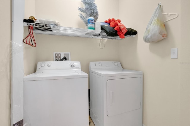 1037 Cypress Pointe Blvd, Davenport, FL 33896 - laundry room with separate washer and dryer