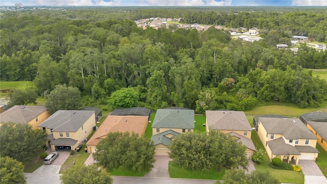 1037 Cypress Pointe Blvd, Davenport, FL 33896 - aerial perspective of suburban area with a forest