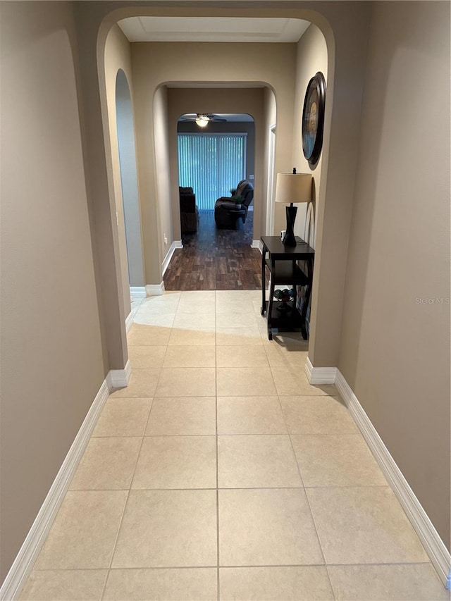 4432 Vermillion Sky Dr, Wesley Chapel, FL 33544 - hall featuring arched walkways and tile patterned flooring