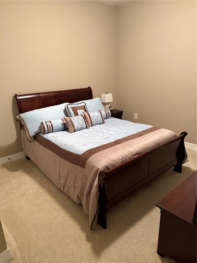 4432 Vermillion Sky Dr, Wesley Chapel, FL 33544 - bedroom with light colored carpet and baseboards