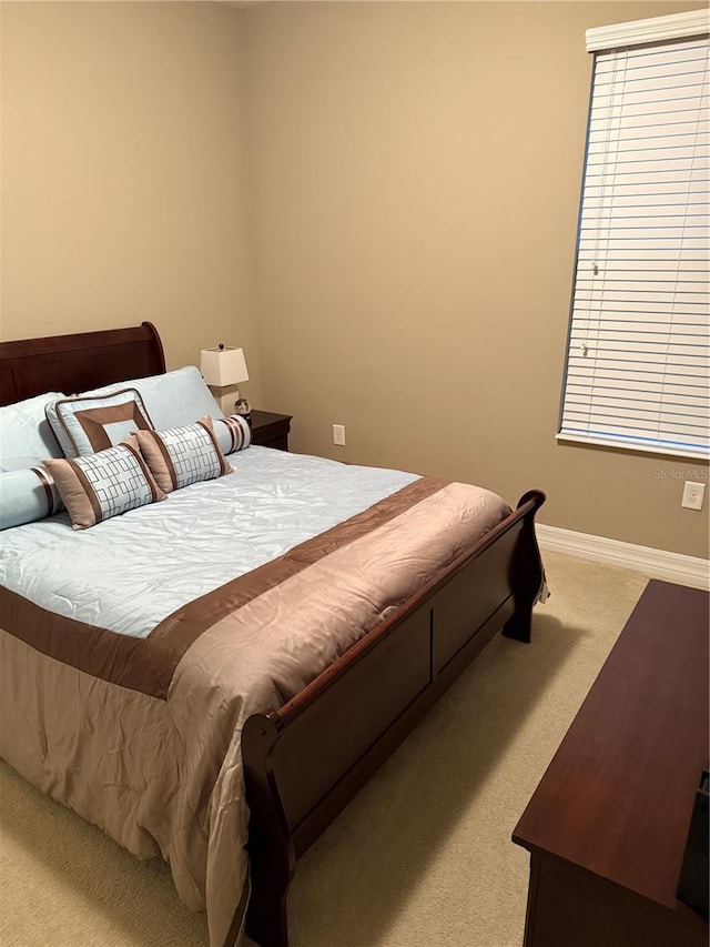 4432 Vermillion Sky Dr, Wesley Chapel, FL 33544 - bedroom with light colored carpet and baseboards