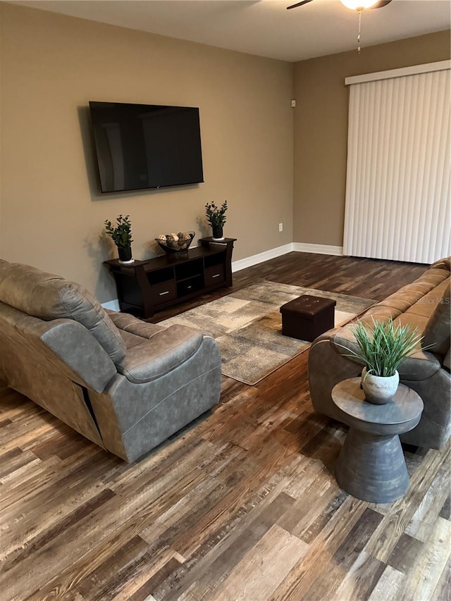 4432 Vermillion Sky Dr, Wesley Chapel, FL 33544 - living area featuring wood finished floors and ceiling fan
