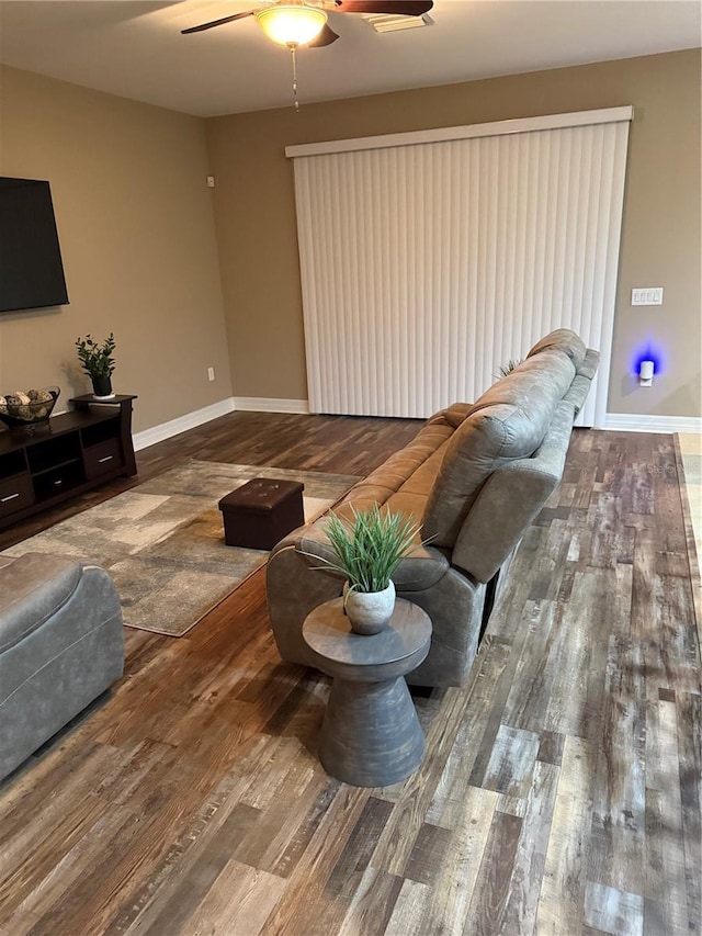 4432 Vermillion Sky Dr, Wesley Chapel, FL 33544 - living area with ceiling fan and wood finished floors
