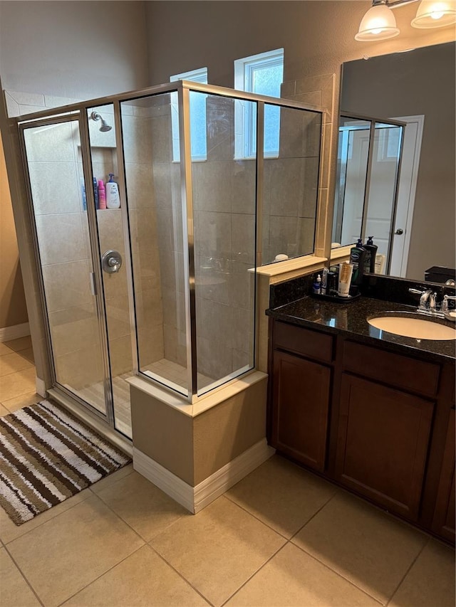 4432 Vermillion Sky Dr, Wesley Chapel, FL 33544 - full bathroom featuring tile patterned flooring, vanity, and a shower stall