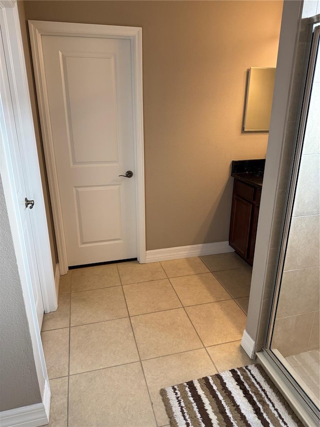 4432 Vermillion Sky Dr, Wesley Chapel, FL 33544 - full bathroom featuring tile patterned floors, a stall shower, and vanity