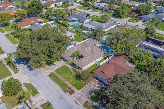 13425 San Rafael Dr, Largo, FL 33774 - aerial view of property and surrounding area featuring nearby suburban area and a pool area