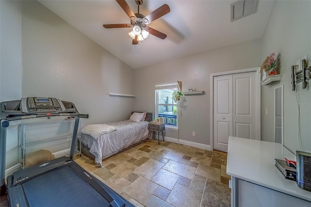13425 San Rafael Dr, Largo, FL 33774 - bedroom featuring stone tile flooring, lofted ceiling, and ceiling fan