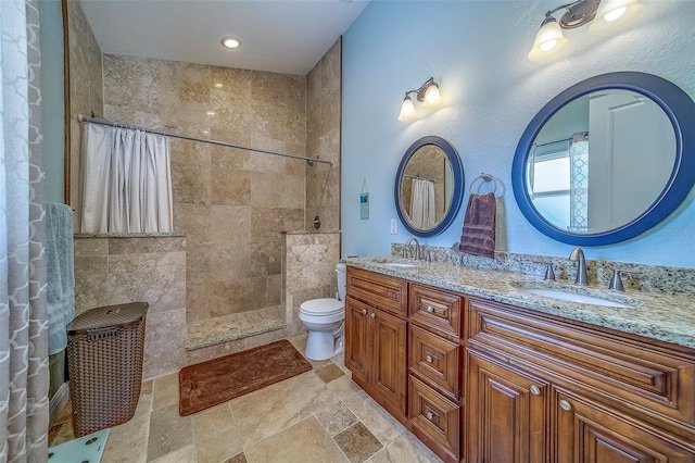 13425 San Rafael Dr, Largo, FL 33774 - full bathroom with double vanity, a walk in shower, and stone finish flooring