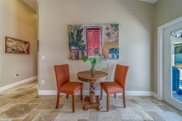 13425 San Rafael Dr, Largo, FL 33774 - dining space with stone tile flooring and baseboards
