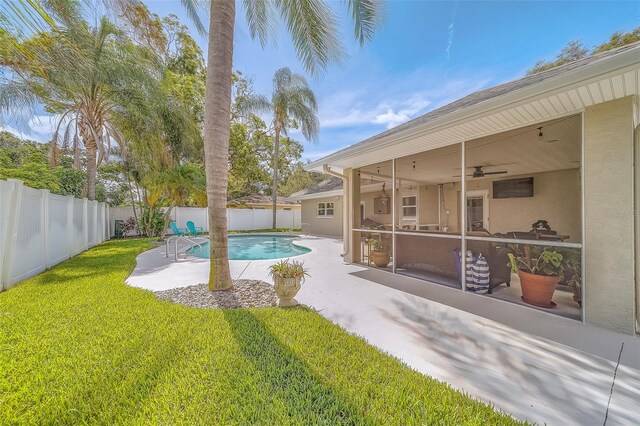 13425 San Rafael Dr, Largo, FL 33774 - view of pool with a fenced backyard, a ceiling fan, and a patio