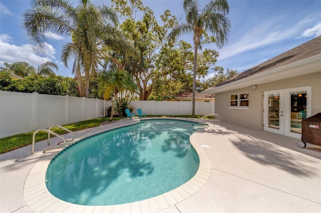 13425 San Rafael Dr, Largo, FL 33774 - view of pool with french doors, a fenced backyard, and a patio
