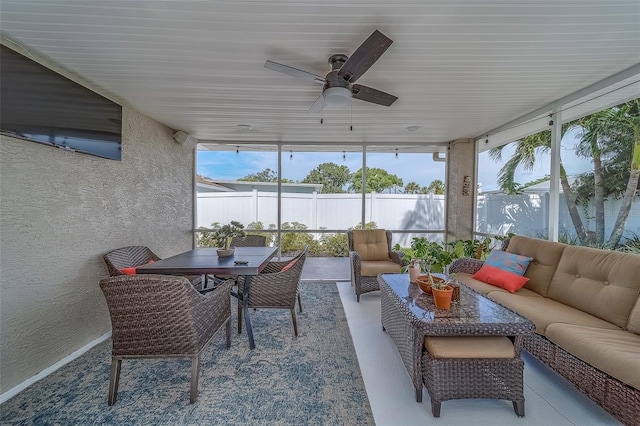 13425 San Rafael Dr, Largo, FL 33774 - sunroom / solarium featuring an outdoor hangout area, plenty of natural light, and a ceiling fan
