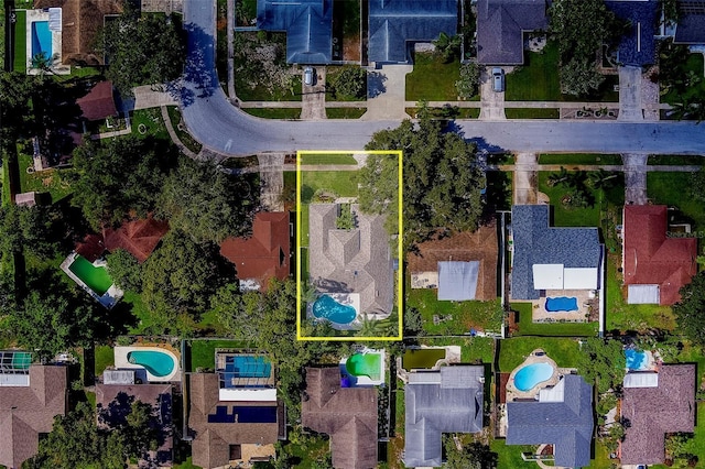 13425 San Rafael Dr, Largo, FL 33774 - aerial view of property and surrounding area featuring property boundaries highlighted and nearby suburban area