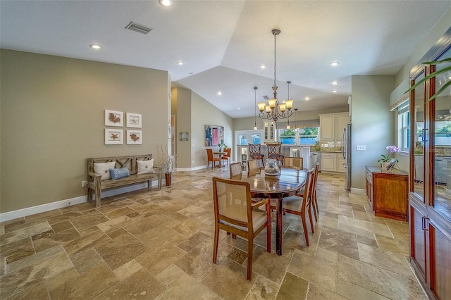 13425 San Rafael Dr, Largo, FL 33774 - dining room with stone tile flooring, a chandelier, lofted ceiling, and recessed lighting