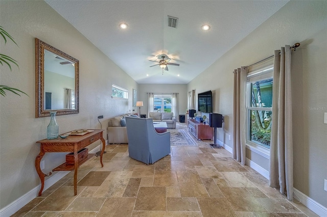 13425 San Rafael Dr, Largo, FL 33774 - living area with stone tile flooring, ceiling fan, and recessed lighting