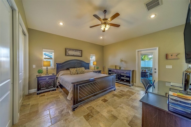 13425 San Rafael Dr, Largo, FL 33774 - bedroom with stone tile flooring, access to outside, recessed lighting, and a ceiling fan