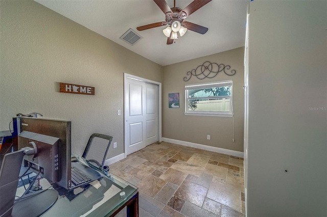 13425 San Rafael Dr, Largo, FL 33774 - home office featuring stone tile flooring and a ceiling fan