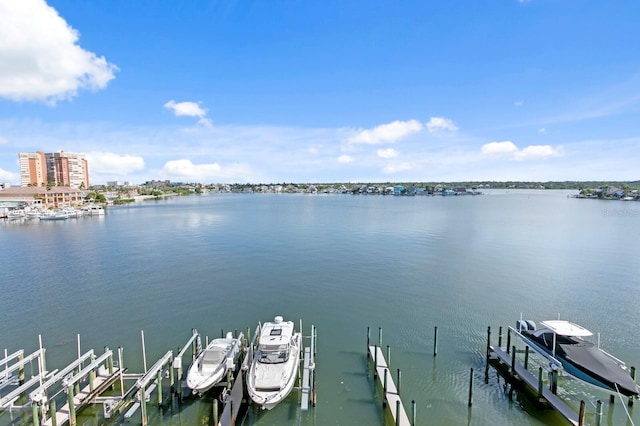 17735 Gulf Blvd Unit 502, Redington Shores, FL 33708 - dock featuring boat lift and a water view