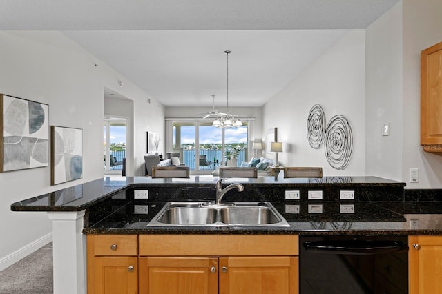 17735 Gulf Blvd Unit 502, Redington Shores, FL 33708 - kitchen featuring dishwasher, open floor plan, carpet floors, and dark stone counters