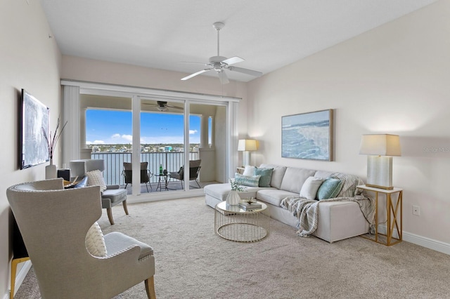 17735 Gulf Blvd Unit 502, Redington Shores, FL 33708 - carpeted living room with a ceiling fan and baseboards